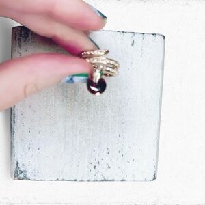 4882. Goldtone Burgundy Snake Ring